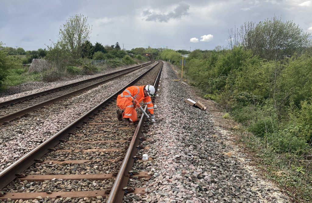 Image of a Sight Automation installation engineer installing Senceive tri-axial twist and cant sensors.